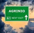 AGRINIO road sign against clear blue sky Royalty Free Stock Photo