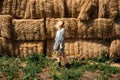 Agritourism and Farm Tours, Farm Cottagecore Weekend Trip. Farm Trips For Peaceful Weekend. A woman in rustic dress and