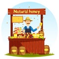 Agronom selling honey at market stall or showcase