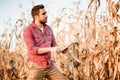 Agronomist portrait of man using tablet in agriculture harvest Royalty Free Stock Photo