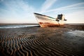 Aground boat on the beach
