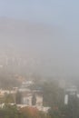 AGUADULCE, SPAIN - 12 DECEMBER 2023 Panorama of dense fog that covered many buildings and the sea landscape in a small seaside