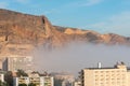 AGUADULCE, SPAIN - 12 DECEMBER 2023 Panorama of dense fog that covered many buildings and the sea landscape in a small seaside