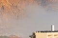 AGUADULCE, SPAIN - 12 DECEMBER 2023 Panorama of dense fog that covered many buildings and the sea landscape in a small seaside