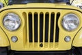 Outdoor vintage car show. Close-up of historic Jeep car model