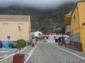 Agulo, La Gomera, Canary Islands, Spain, december 27, 2021: Cobbled street with colorful houses in the village of Agulo