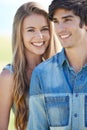 Ahhhhh, young love. A young couple enjoying a beautiful day outdoors together. Royalty Free Stock Photo