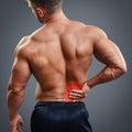 Ahtletic muscle man back pain Royalty Free Stock Photo