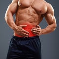Ahtletic muscle man Pain in abdomen Royalty Free Stock Photo
