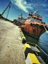 Offshore vessel berthing at harbour