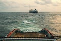 AHTS vessel doing static tow tanker lifting. Ocean tug job Royalty Free Stock Photo