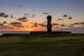 Ahu Tahai Moai Statue wearing topknot with eyes painted at sunset near Hanga Roa - Easter Island, Chile