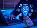 AI agent concept with glowing robot icon in light bulb. Represents autonomous artificial intelligence programs that analyze, Royalty Free Stock Photo