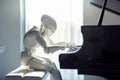 AI android robot playing piano. Generative AI Royalty Free Stock Photo