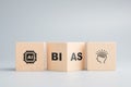 AI bias and human judgment concept with wood blocks Royalty Free Stock Photo