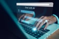 AI Chatbot. Businessman using computer with artificial intelligence with command prompt for generate. Technology links information Royalty Free Stock Photo