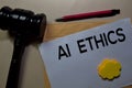 AI Ethics text on document above brown envelope and stethoscope. Healthcare or medical concept Royalty Free Stock Photo