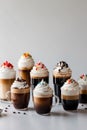 Assortment of Coffee Drinks with Whipped Cream and Toppings. Royalty Free Stock Photo