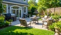 Inviting Backyard Patio With Comfortable Seating And Outdoor Grill In A Sunlit Garden Setting Royalty Free Stock Photo