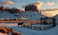 A horse is standing in a fenced area in the snow. Royalty Free Stock Photo