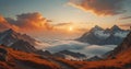 A beautiful sunset over a mountain range with clouds in the sky. Royalty Free Stock Photo