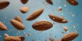 A bunch of almonds are falling from the sky. Royalty Free Stock Photo