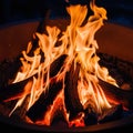 AI Generated campfire with blowing flame at night Royalty Free Stock Photo
