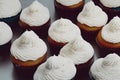 AI-generated chocolate cupcakes decorated with white cream