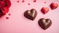 chocolate hearts and roses on a pink background Royalty Free Stock Photo