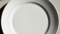 AI-generated close-up of an empty white plate Royalty Free Stock Photo