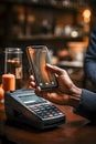 AI generated a close-up of a hand holding a cell phone close to a dataphone to pay the bill in a restaurant. Royalty Free Stock Photo