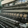 AI-Generated Close-Up of Industrial Textile Machine with Thread Spools Royalty Free Stock Photo