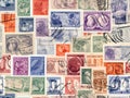 AI-generated collection of colorful, vintage stamps with various postmarks Royalty Free Stock Photo