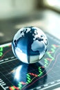 Glass Globe On Stock Market Chart Representing Global Financial Trends Royalty Free Stock Photo