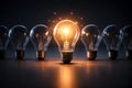 Glowing Light Bulb Symbolizing Creative Idea Innovation And Stand Out Thinking Concept Royalty Free Stock Photo