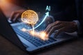 AI generated digital workspace with hands typing on laptop featuring glowing ai brain upward arrow and data graphics symbolizing Royalty Free Stock Photo