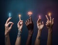 diversity hands raised up with different colored lights of religious symbols on top of them Royalty Free Stock Photo