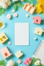 AI-generated empty white message card surrounded by house figures, flowers and a memo note