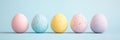 AI-Generated Five pastel-colored eggs are carefully lined up against a soft light blue background, creating a simple yet elegant Royalty Free Stock Photo