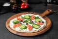 AI-generated flatbread pizza with fresh vegetables Royalty Free Stock Photo