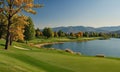 A golf course with a lake in the background. Royalty Free Stock Photo