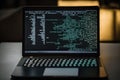 AI generated hacker laptop with binary computer code internet and network security Royalty Free Stock Photo