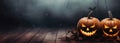 AI generated. Halloween pumpkin with a scary smiling luminous face with copy space on a fog smoke dark background Royalty Free Stock Photo