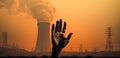 AI generated a hand emerging from the ground in front of a nuclear power plant. Let\'s stop nuclear power.