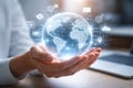 AI generated hands holding glowing digital globe with world map and floating icons for big data cloud computing iot communication Royalty Free Stock Photo