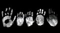 high contras white handprints isolated on black background Royalty Free Stock Photo
