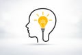 AI generated human head outline with glowing lightbulb inside representing creativity inspiration innovation thinking problem Royalty Free Stock Photo