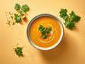 AI generated illustration of Aawholesome bowl of orange pumpkin soup on a bright orange surface