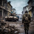 a man in camo walking near some ruins and tanks