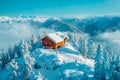 AI generated illustration of an aerial view of cabin in snowy mountain setting Royalty Free Stock Photo